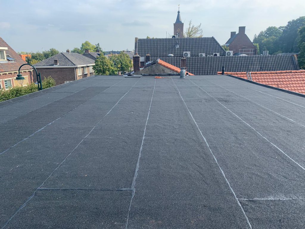 platte bitumen dak renovatie dakdekker